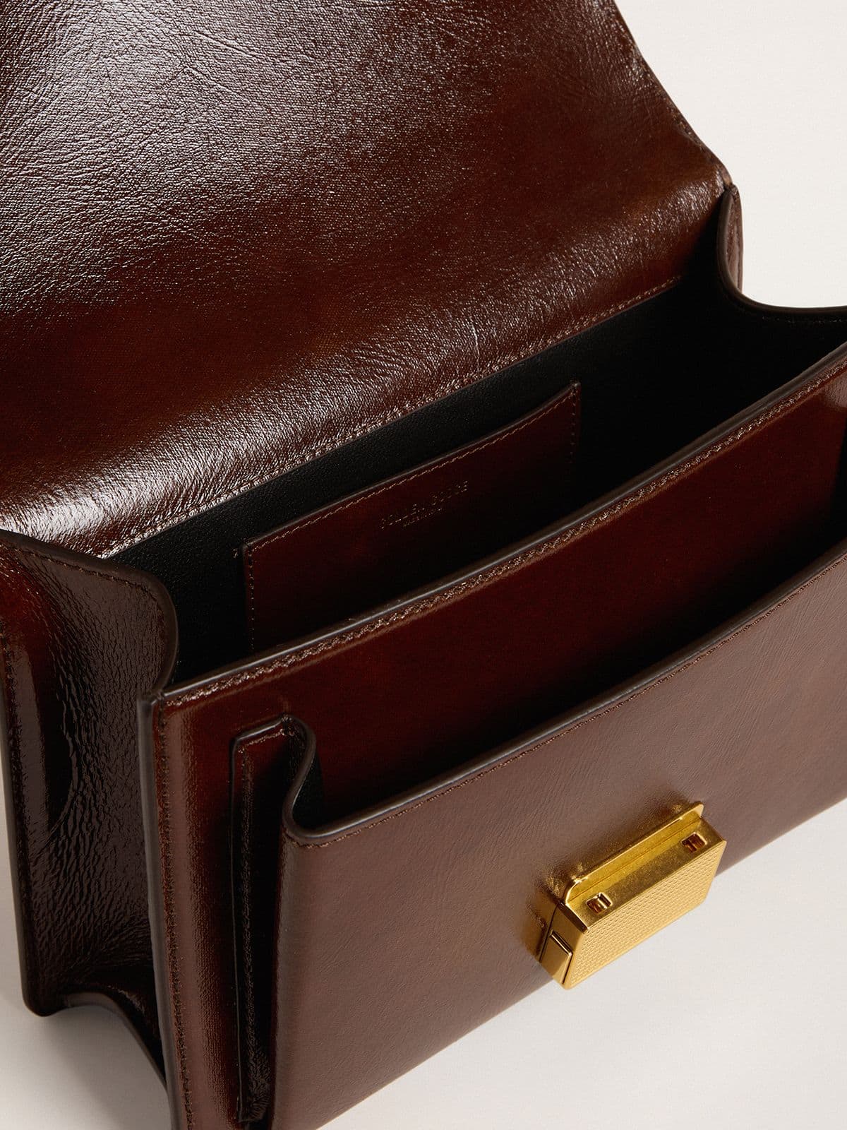 Venezia Bag in dark brown laminated leather with gold details | Golden Goose