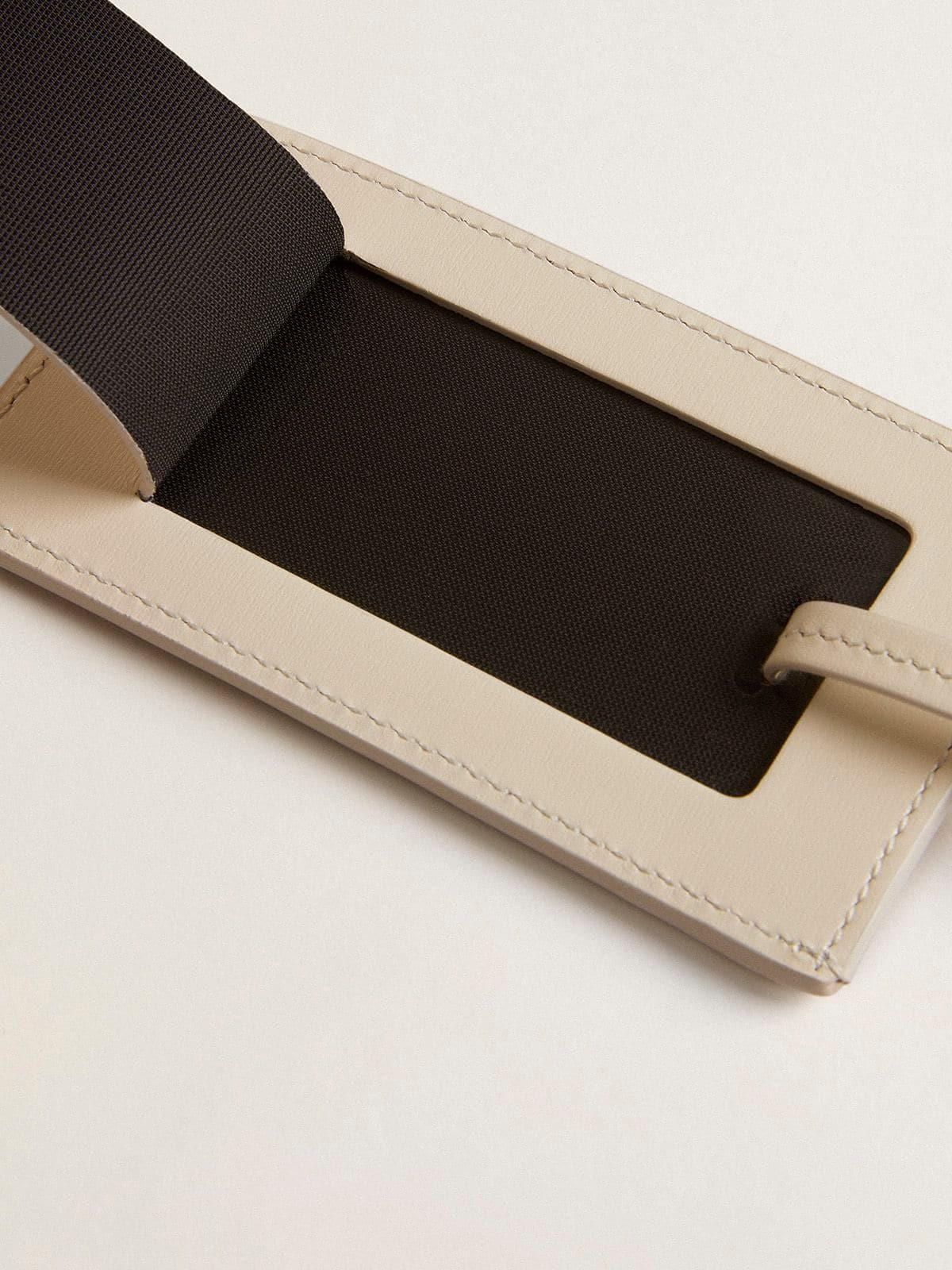 Worn white luggage tag | Golden Goose