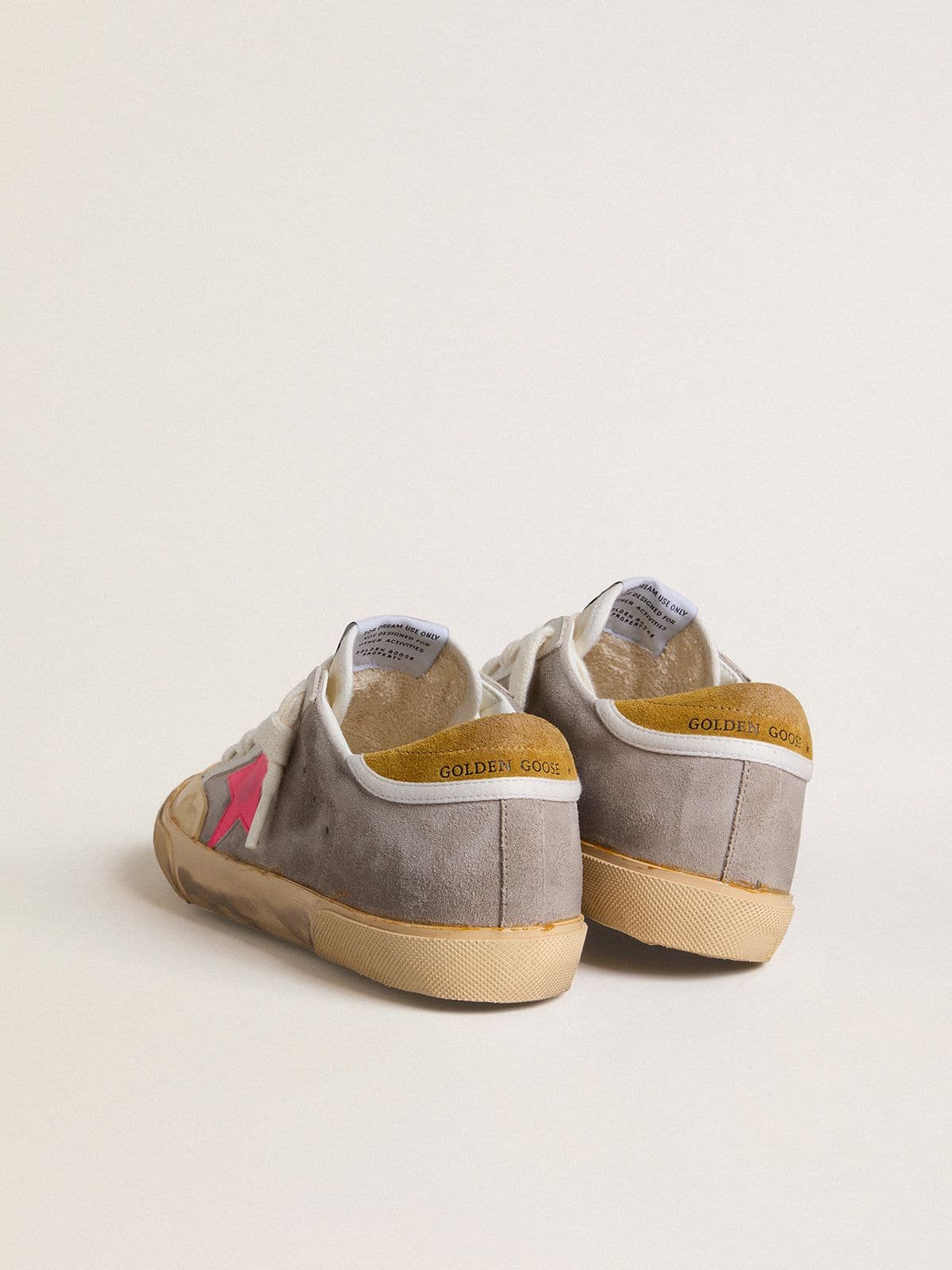 Women's Super-Star in dove-gray suede with fuchsia leather star and ocher suede heel tab | Golden Goose