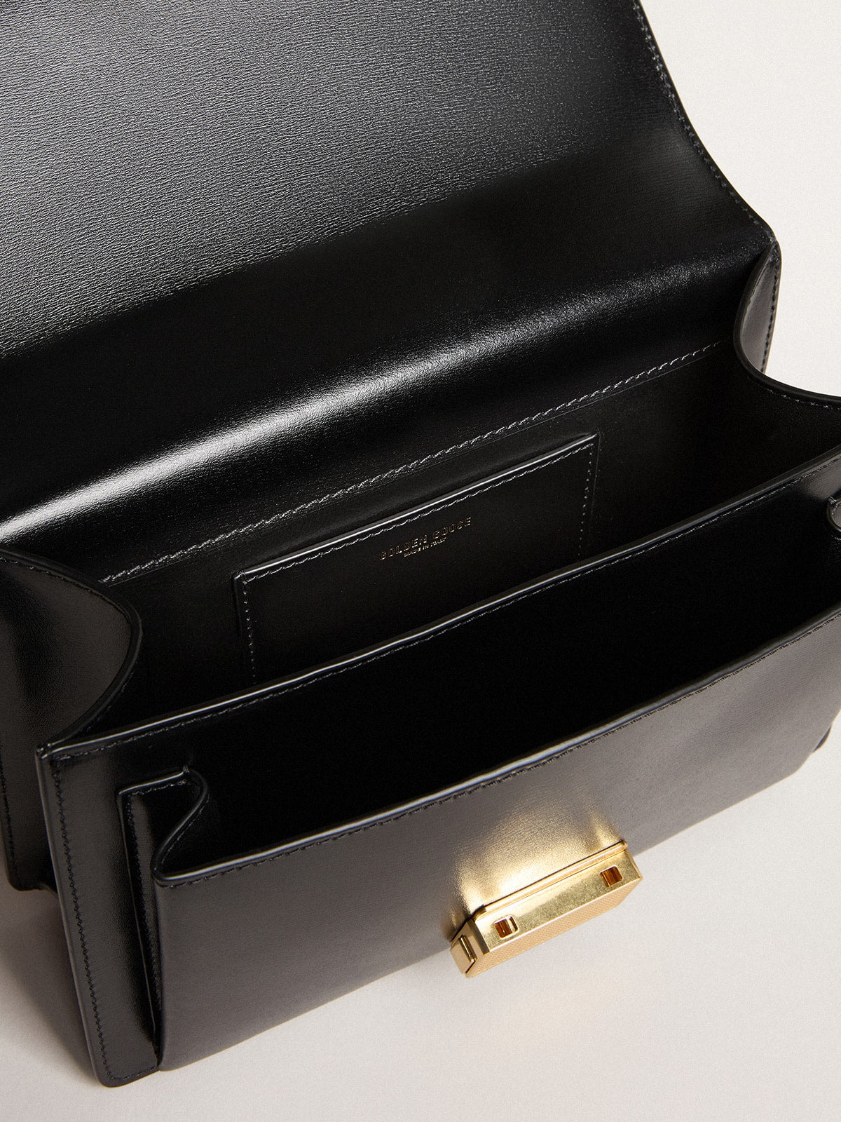 Venezia Bag in black boarded leather with gold details | Golden Goose