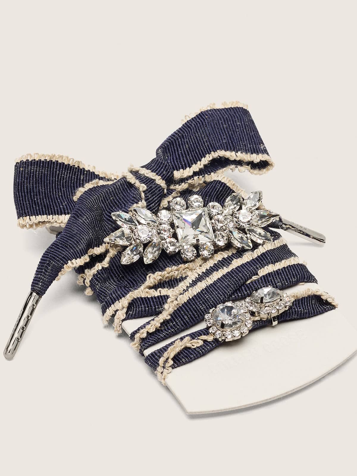 Skins denim blue laces embellished with beige trim and two charms | Golden Goose