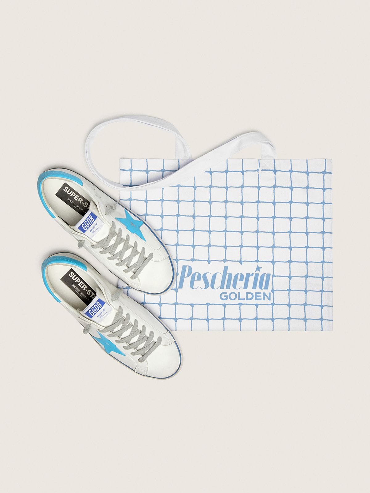 Men's Super-Star LTD in white leather with light blue leather star and heel tab | Golden Goose