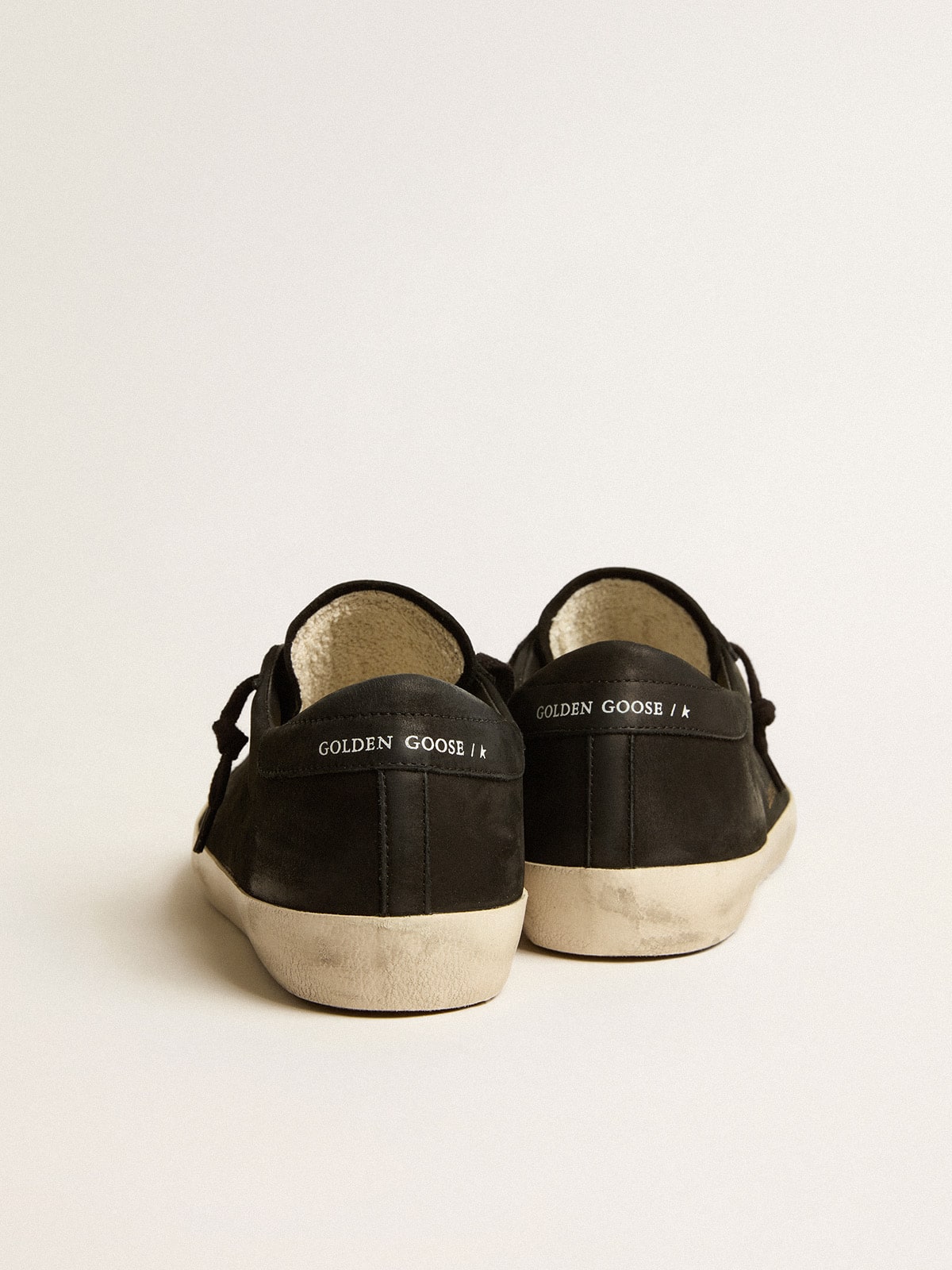 Men's Super-Star in black nubuck with perforated star and black nubuck heel tab | Golden Goose