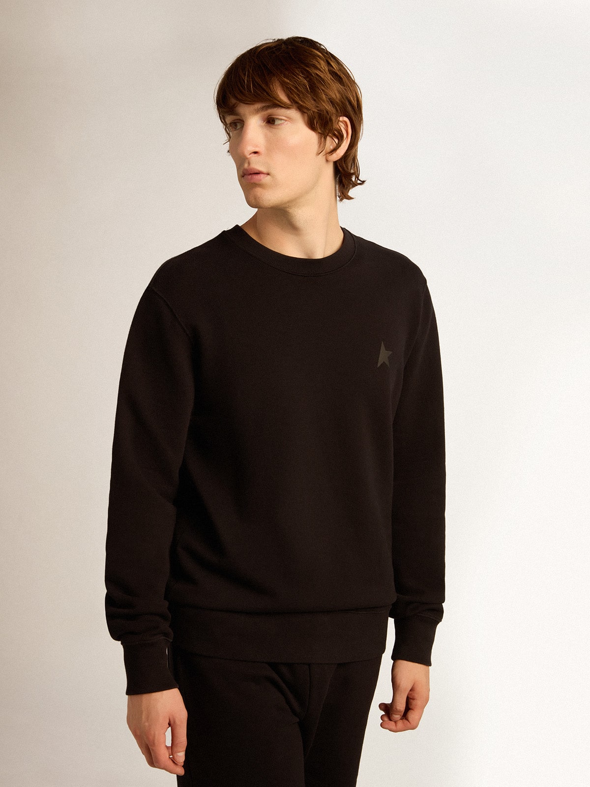 Black Archibald Star Collection sweatshirt with tone-on-tone star on the front | Golden Goose