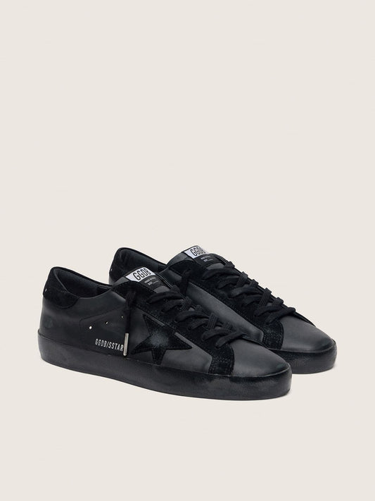 Women's Super-Star in black nappa with black suede star and heel tab | Golden Goose