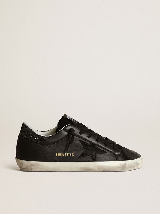 Women's Super-Star in black nappa with black star and glitter heel tab | Golden Goose