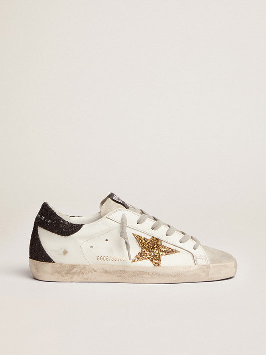 Women’s Super-Star in nappa leather with gold glitter star and black glitter heel tab | Golden Goose