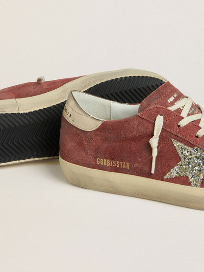 Women's Super-Star LTD in red suede with silver glitter star and laminated leather heel tab | Golden Goose