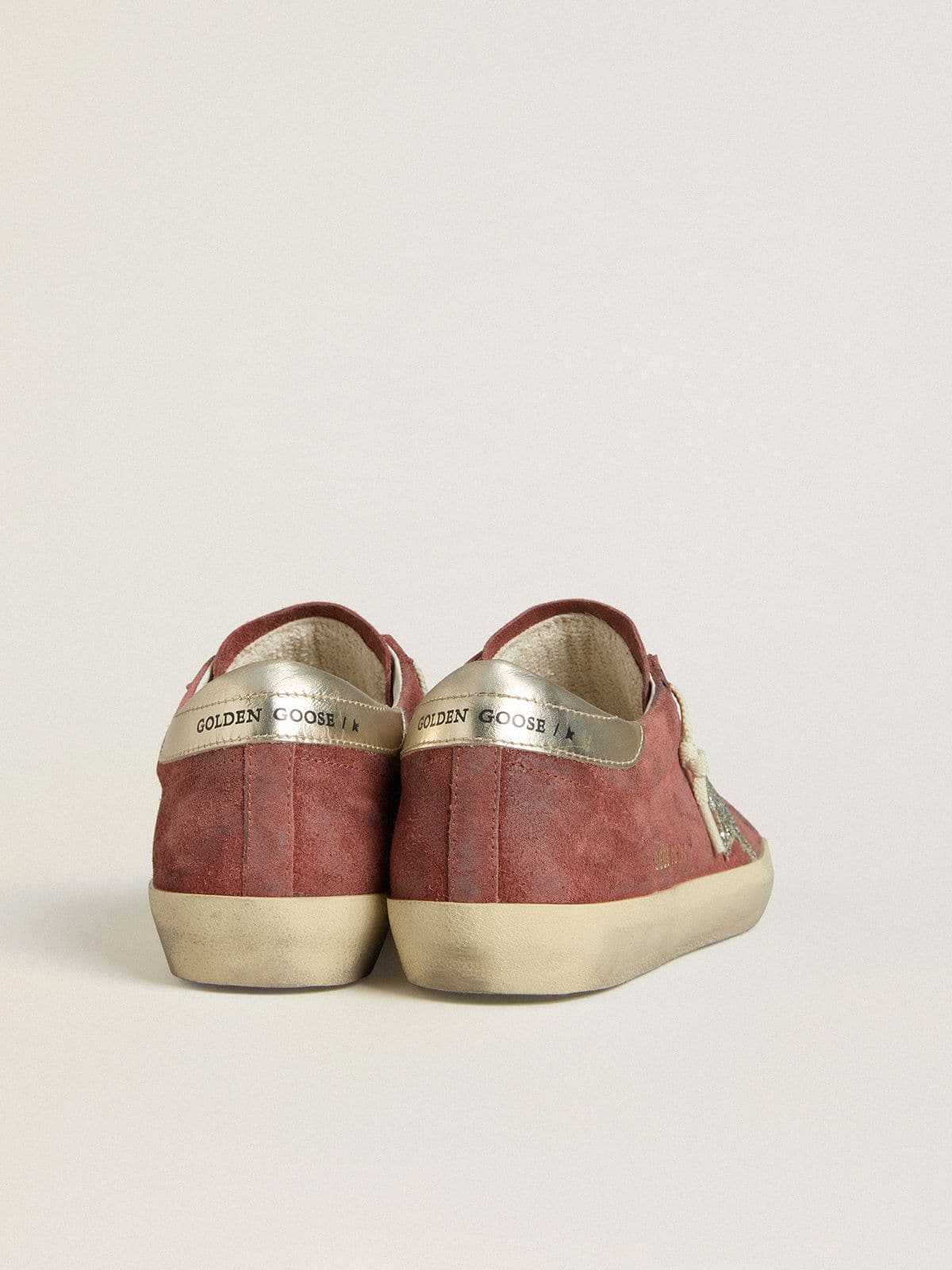 Women's Super-Star LTD in red suede with silver glitter star and laminated leather heel tab | Golden Goose
