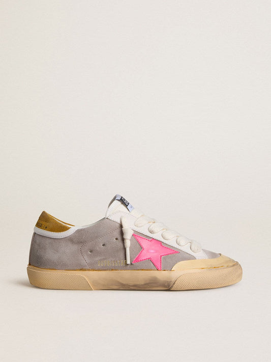 Women's Super-Star in dove-gray suede with fuchsia leather star and ocher suede heel tab | Golden Goose