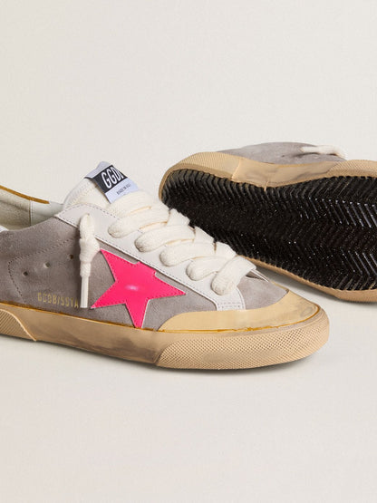 Women's Super-Star in dove-gray suede with fuchsia leather star and ocher suede heel tab | Golden Goose