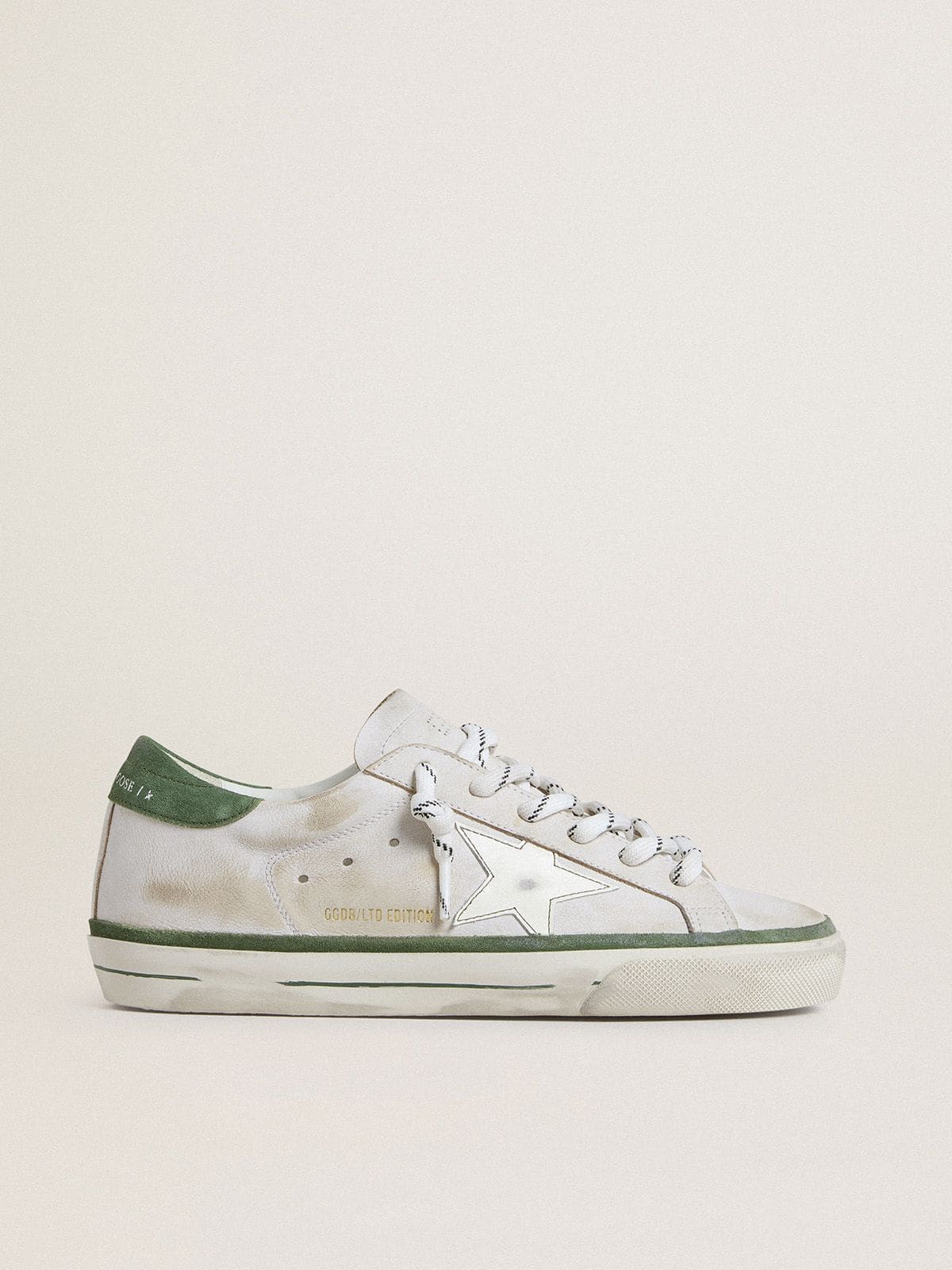 Women's Super-Star LTD with white leather star and green suede heel tab | Golden Goose