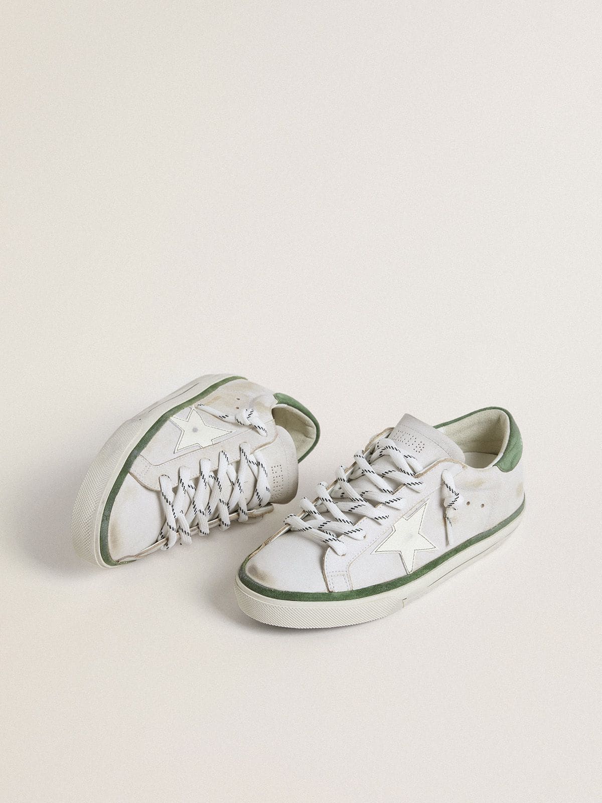 Women's Super-Star LTD with white leather star and green suede heel tab | Golden Goose