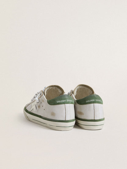 Women's Super-Star LTD with white leather star and green suede heel tab | Golden Goose