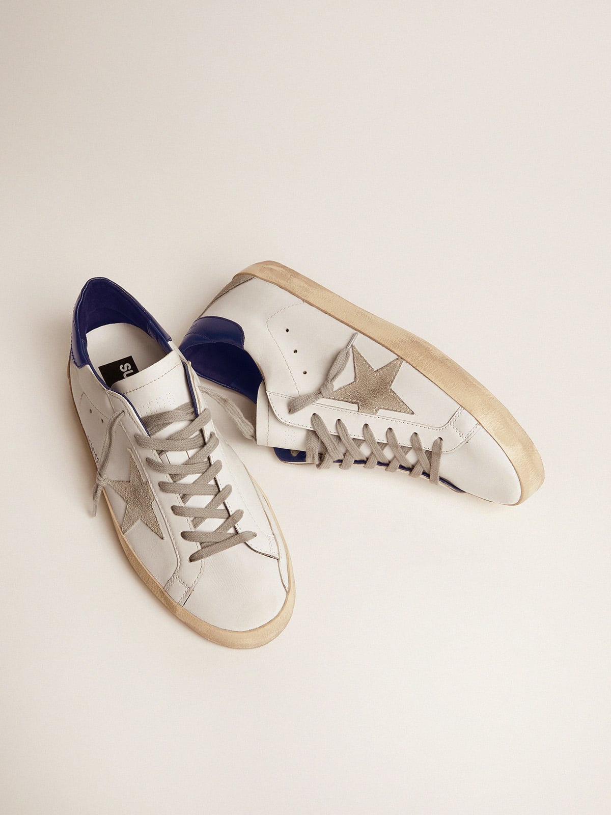 Women's blue and white Super-Star sneakers | Golden Goose | Golden Goose