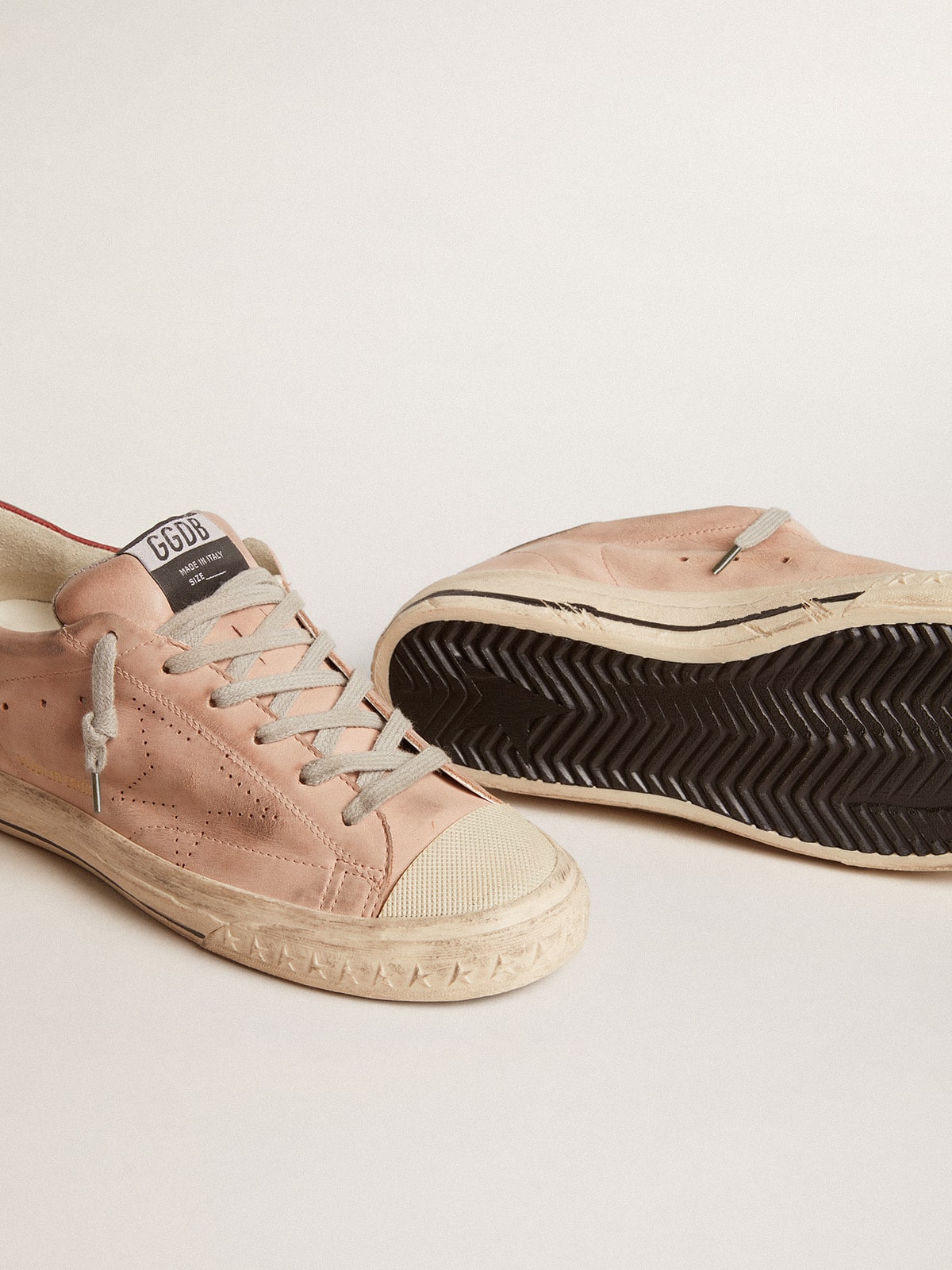 Super-Star LTD in pink nubuck with perforated star and leather heel tab | Golden Goose