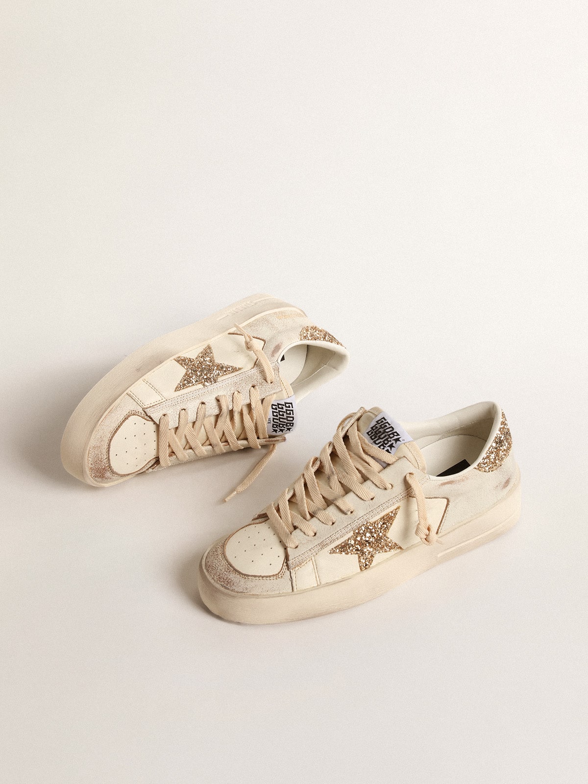 Women’s Stardan in ecru nappa leather with gold glitter star and heel tab | Golden Goose