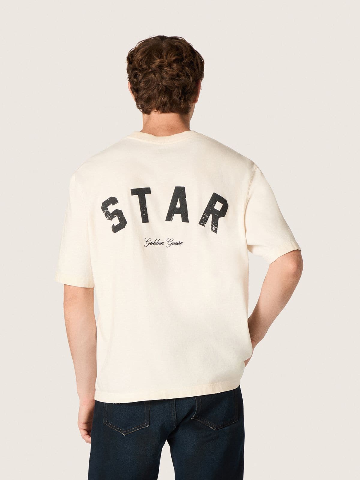 Star unisex cotton T-shirt in vintage white with black print on the back | Golden Goose
