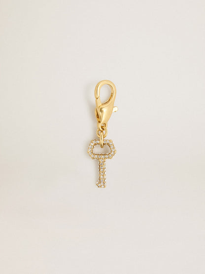 Key-shaped charm in gold-colored brass with crystals | Golden Goose