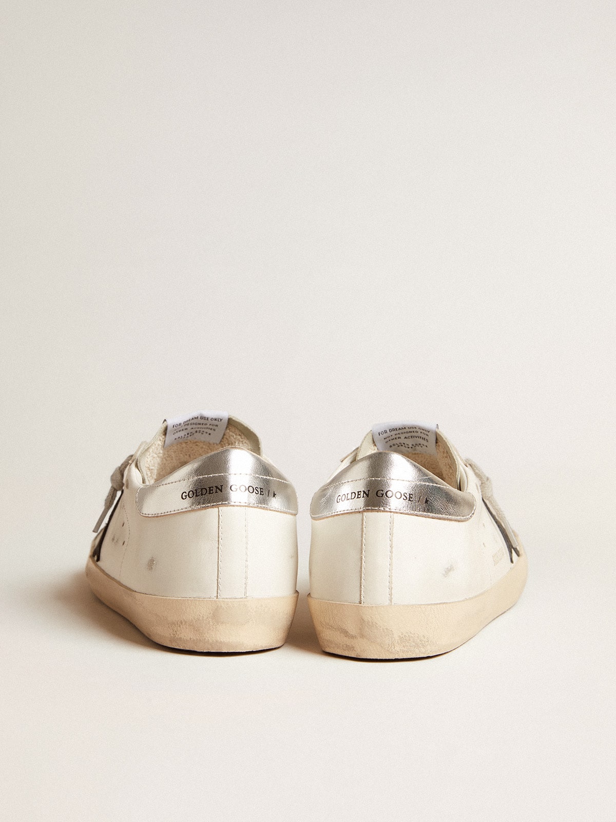 Men's Super-Star in white leather with black nubuck star and silver metallic leather heel tab | Golden Goose