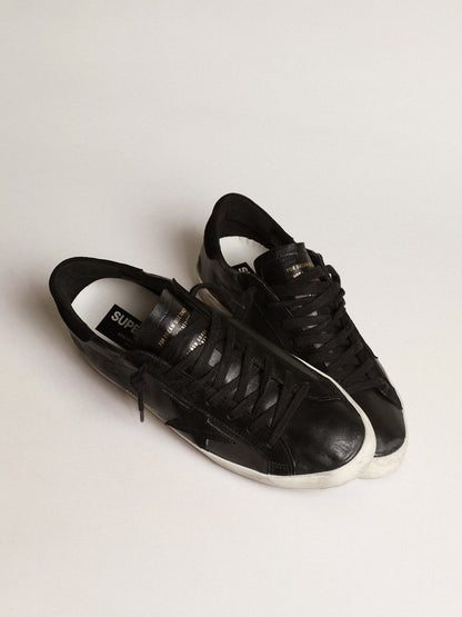 Men's Super-Star in black nappa with black suede star and heel tab | Golden Goose