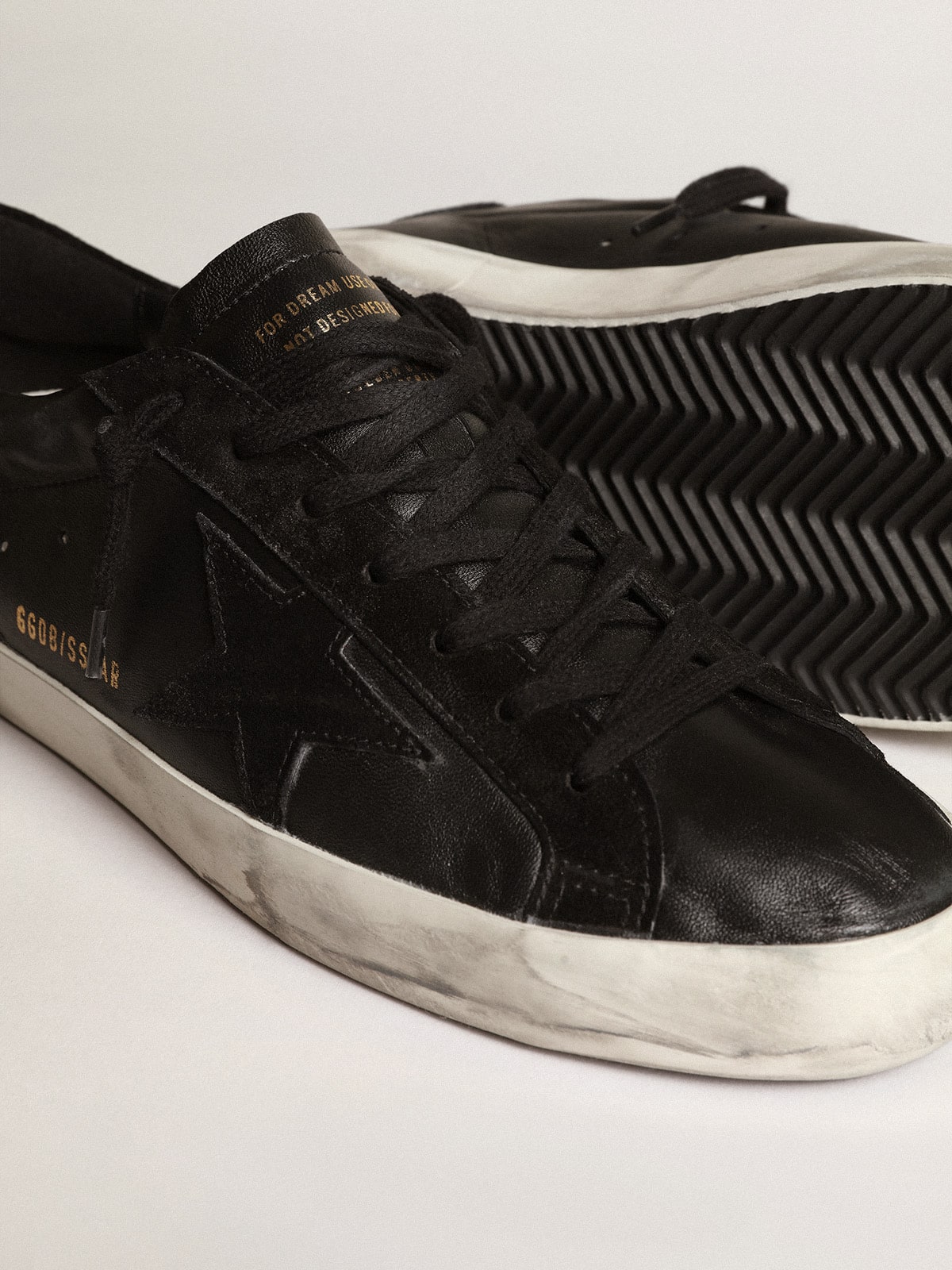 Men's Super-Star in black nappa with black suede star and heel tab | Golden Goose