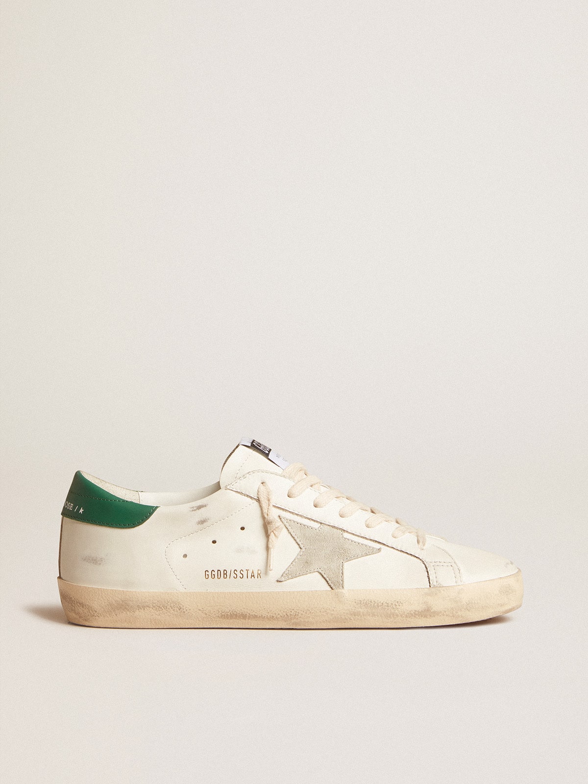 Super-Star in white leather with ice-gray suede star and green leather heel tab | Golden Goose