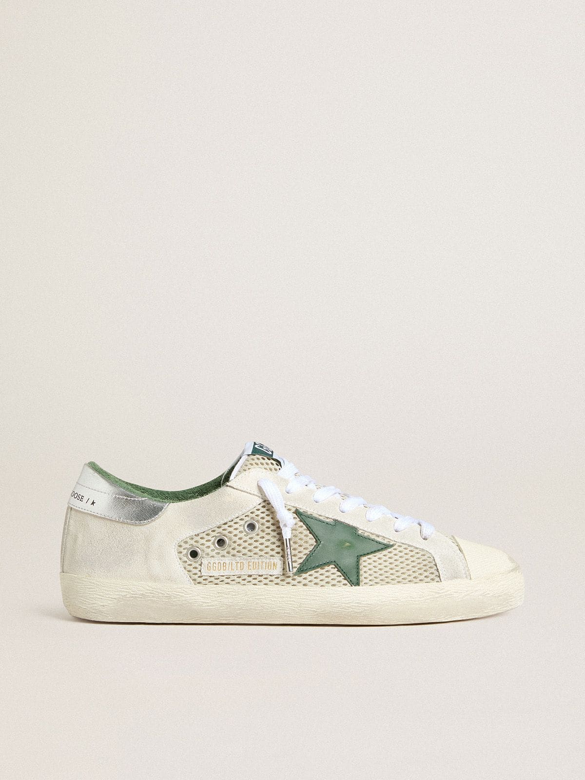 Men’s Super-Star LTD in white suede and mesh with green leather star and silver heel tab | Golden Goose