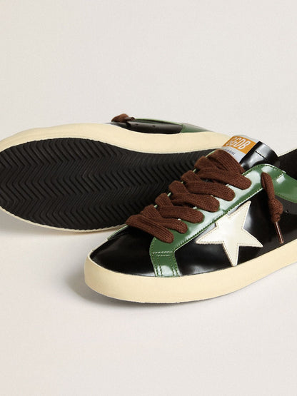 Men’s Super-Star LTD in black laminated leather with white leather star and heel tab | Golden Goose