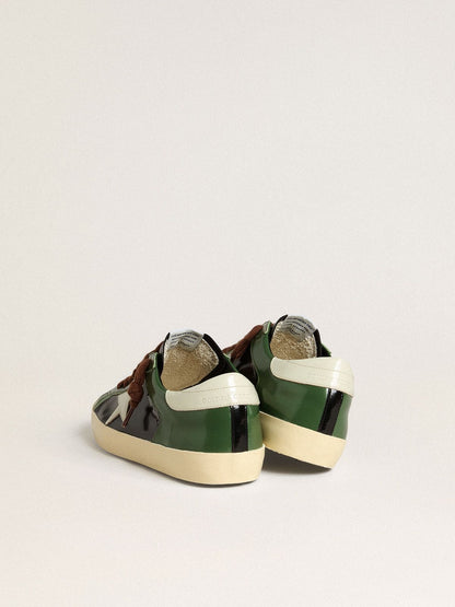 Men’s Super-Star LTD in black laminated leather with white leather star and heel tab | Golden Goose