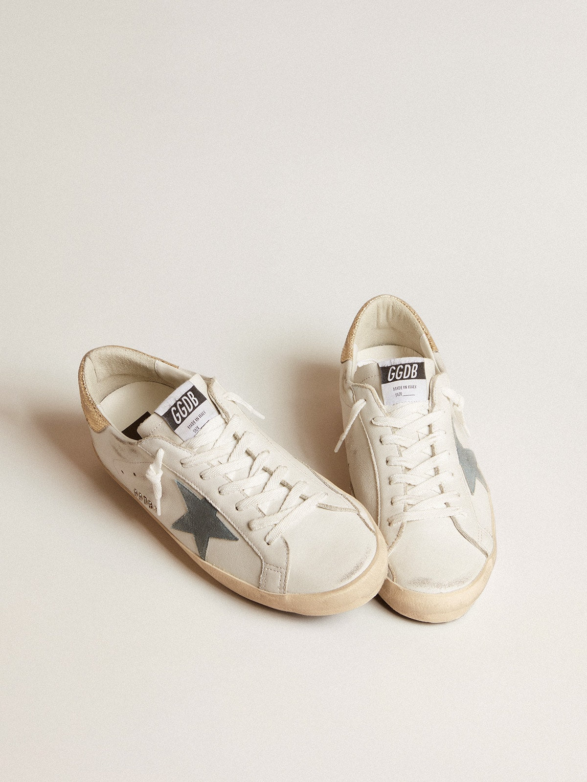 Men's Super-Star with suede star and platinum snake-print leather heel tab | Golden Goose