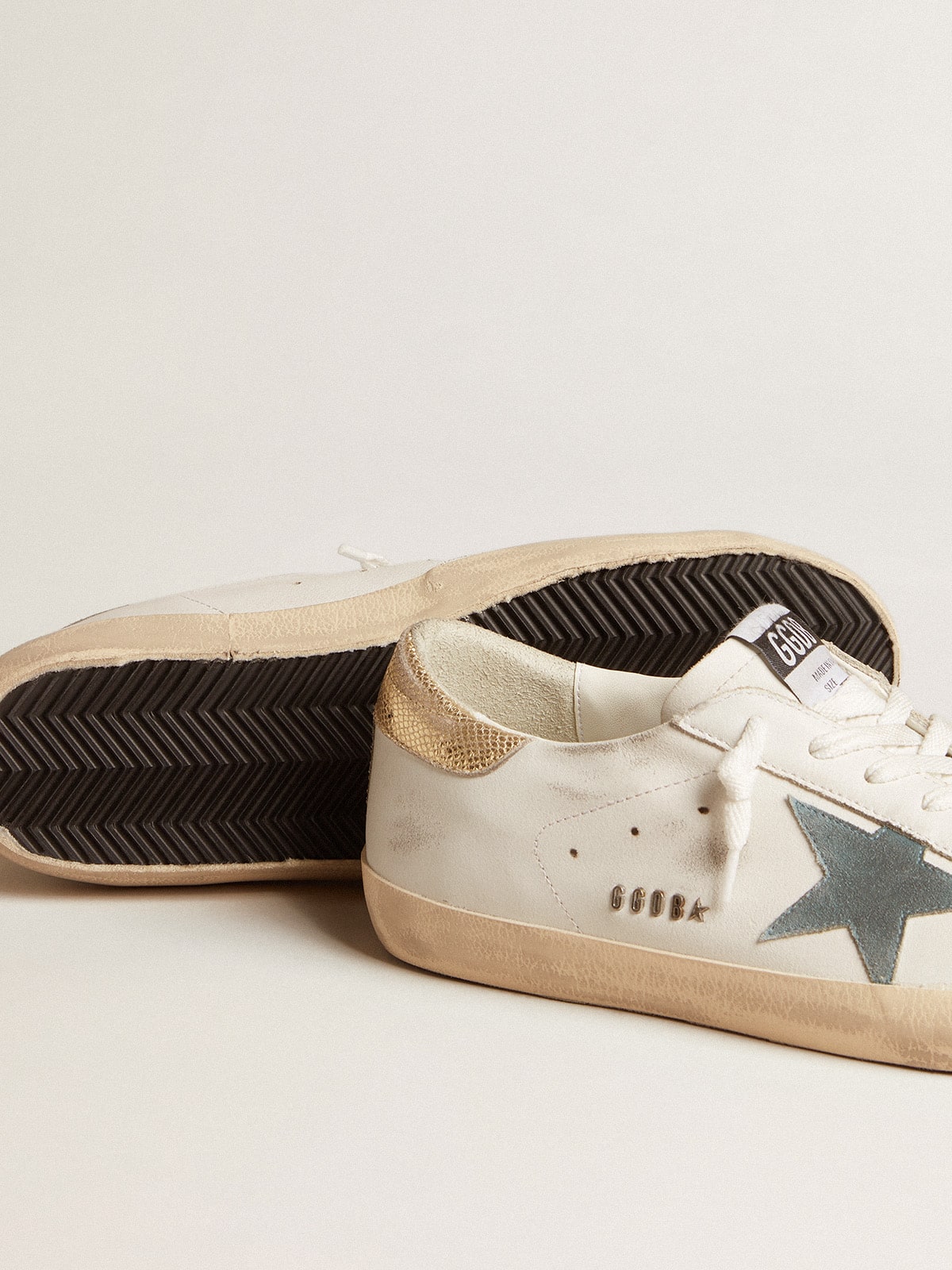 Men's Super-Star with suede star and platinum snake-print leather heel tab | Golden Goose