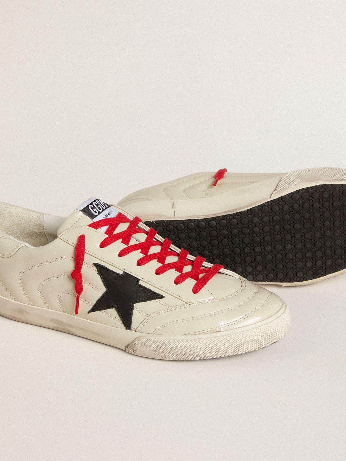 Men's Super-Star in glossy white matelassé leather with black leather star | Golden Goose