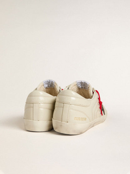 Men's Super-Star in glossy white matelassé leather with black leather star | Golden Goose