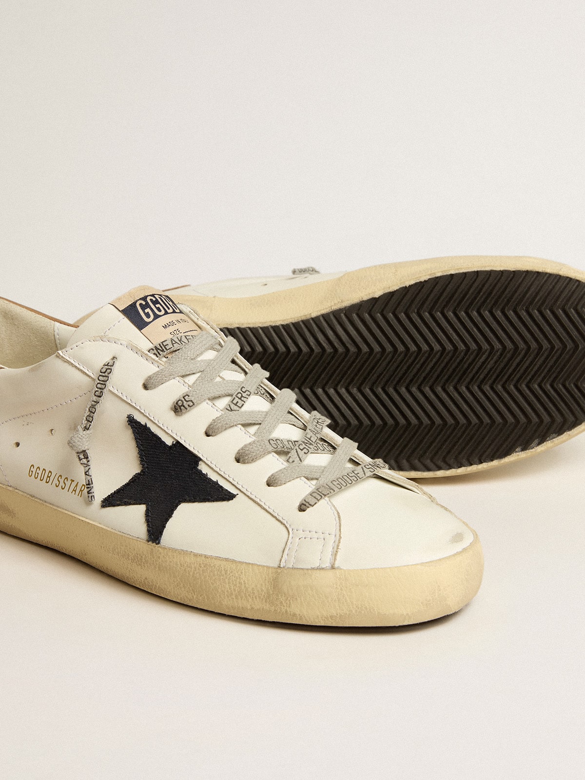Men's Super-Star in white leather with midnight-blue canvas star and tobacco leather heel tab | Golden Goose