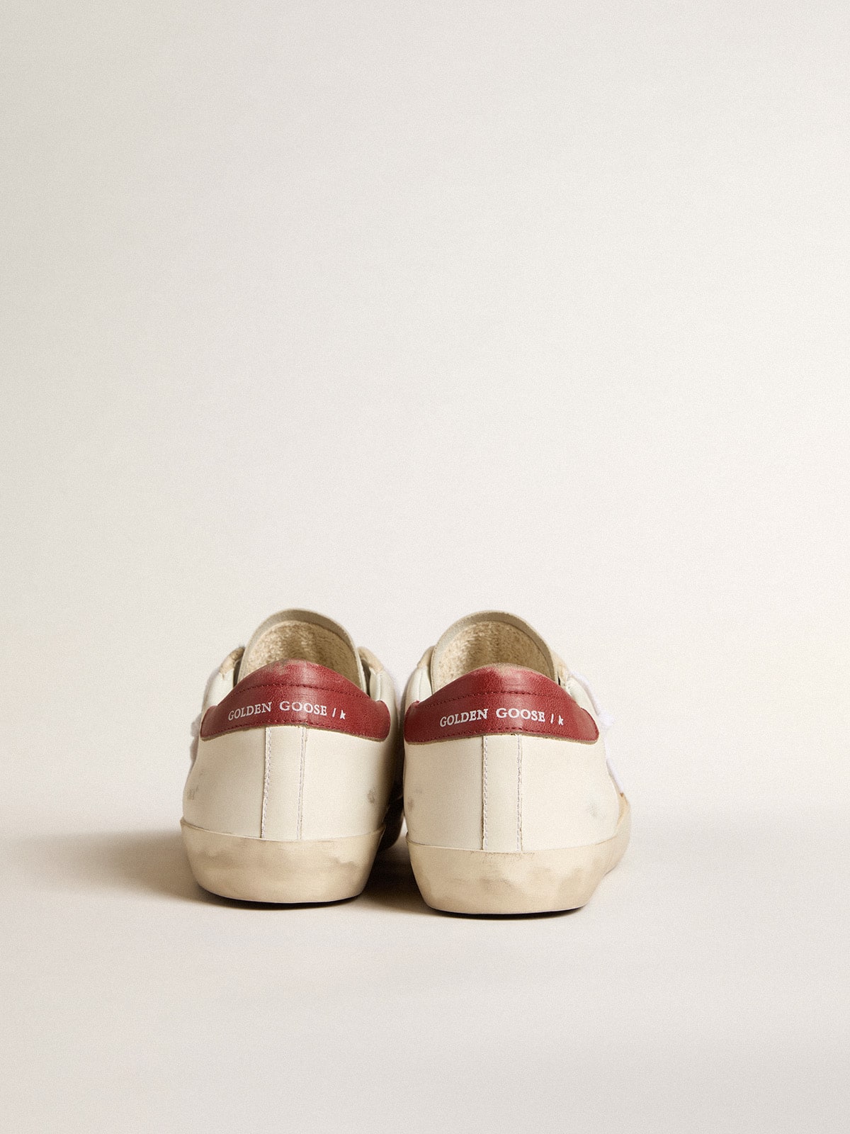 Men's Super-Star LTD in suede with green metallic star and red heel tab | Golden Goose
