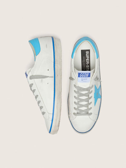 Men's Super-Star LTD in white leather with light blue leather star and heel tab | Golden Goose