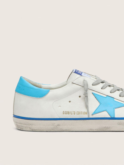 Men's Super-Star LTD in white leather with light blue leather star and heel tab | Golden Goose