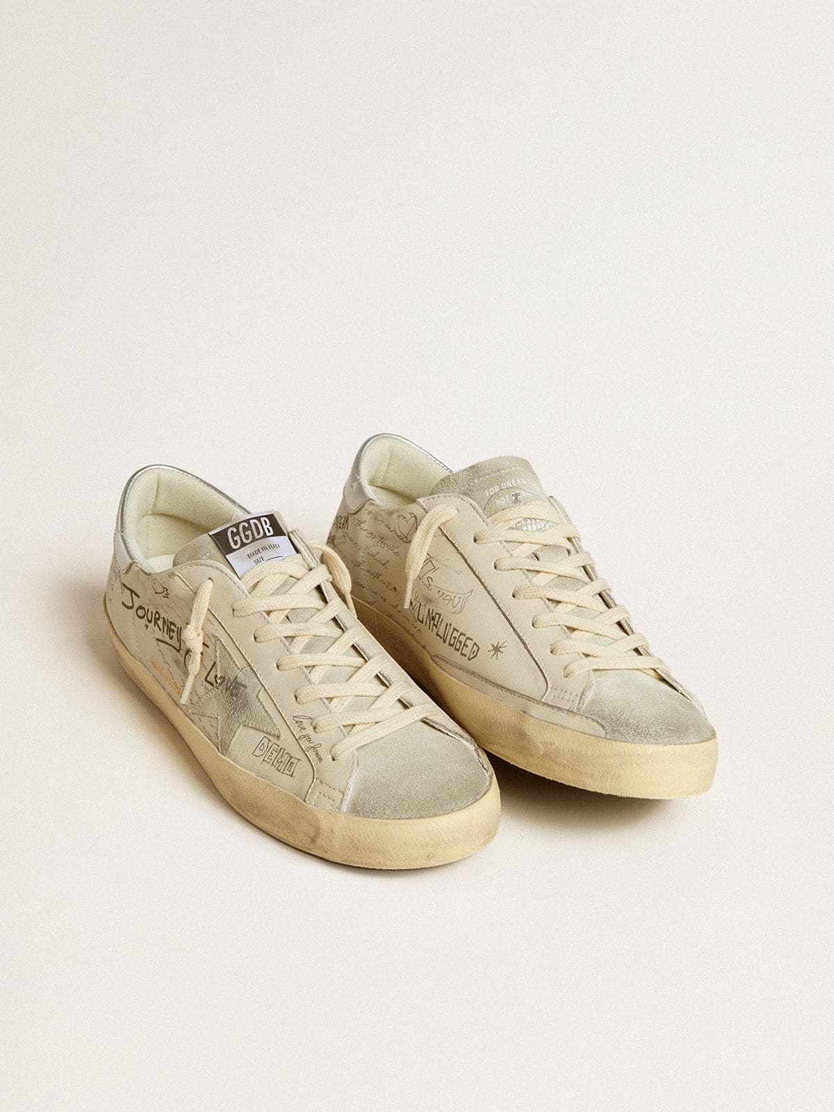 Men's Super-Star  in white leather with all-over lettering and ice-gray suede star | Golden Goose