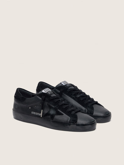 Men's Super-Star in black nappa with black suede star and heel tab | Golden Goose