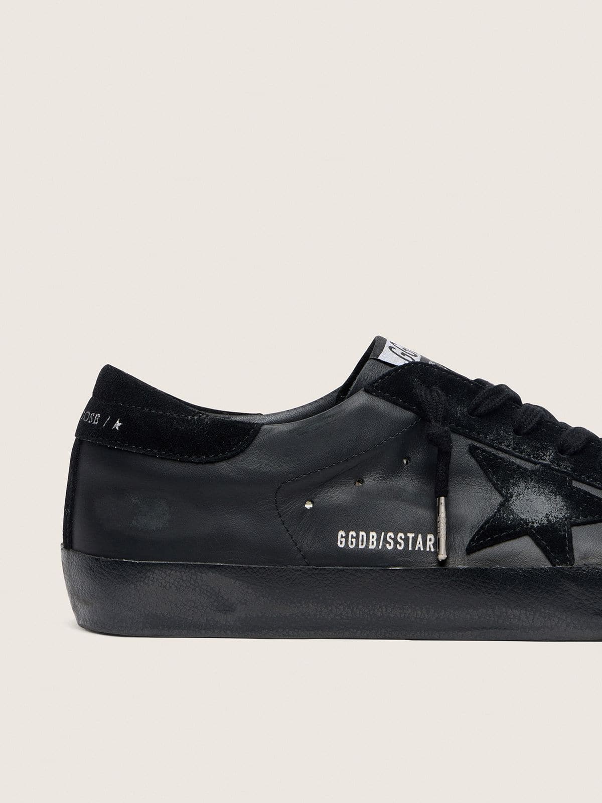 Men's Super-Star in black nappa with black suede star and heel tab | Golden Goose