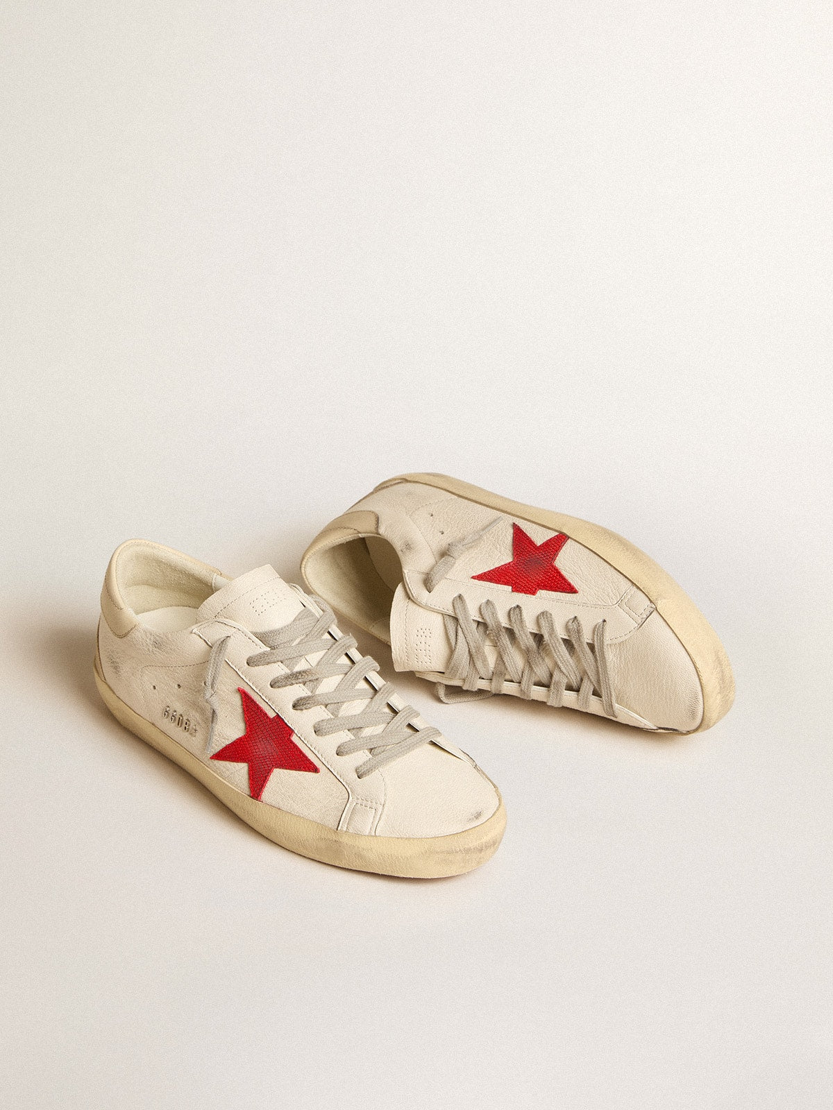 Men's Super-Star in nappa with red star and cream leather heel tab | Golden Goose