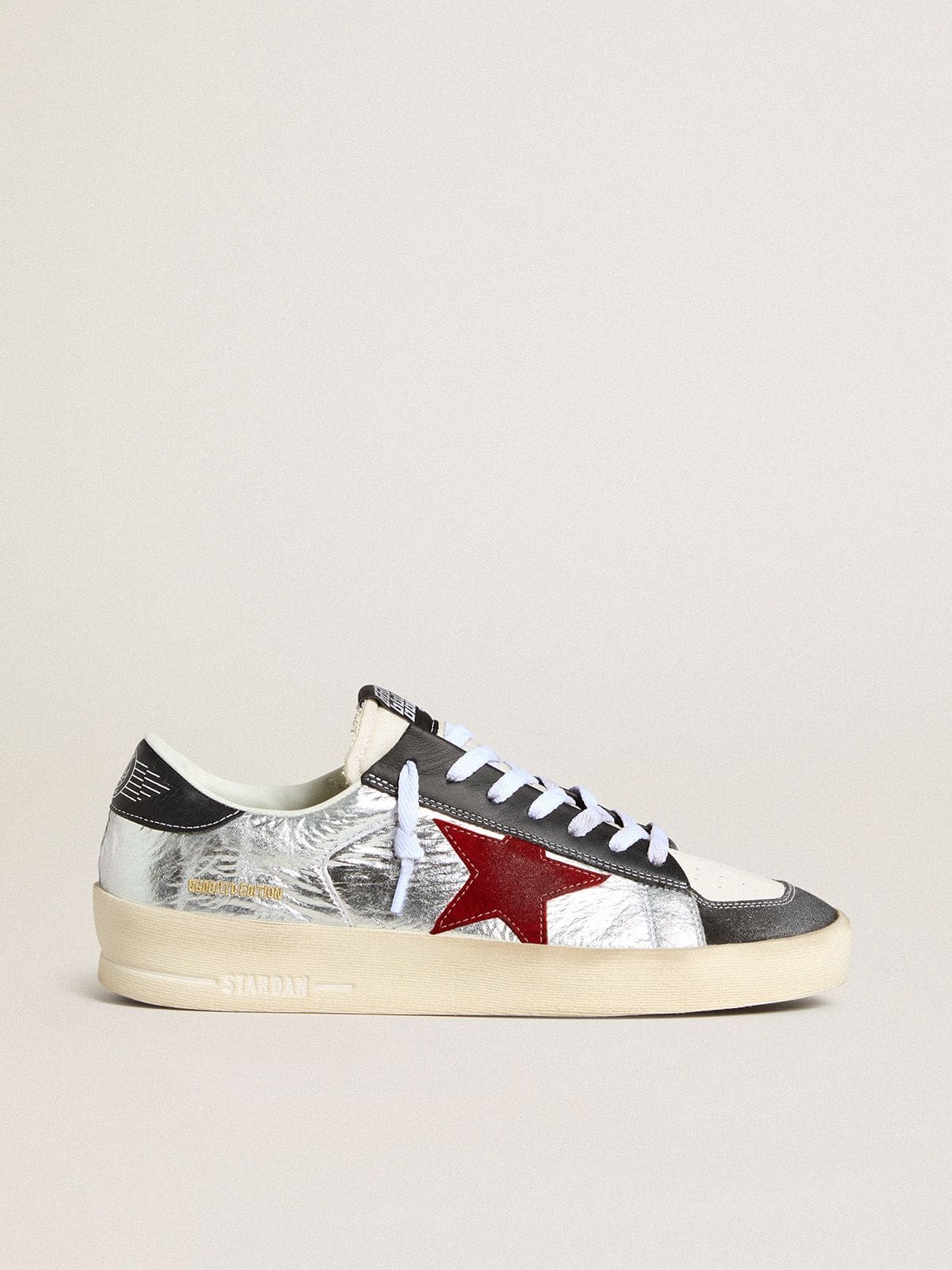 Men’s Stardan in laminated silver nylon with burgundy suede star | Golden Goose