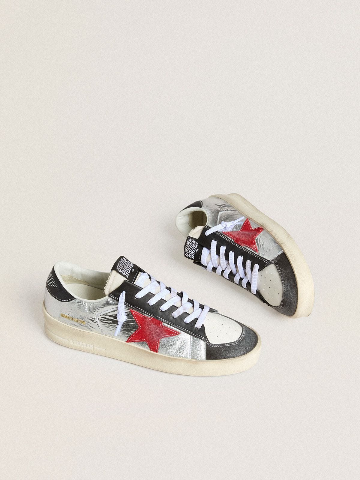 Men’s Stardan in laminated silver nylon with burgundy suede star | Golden Goose