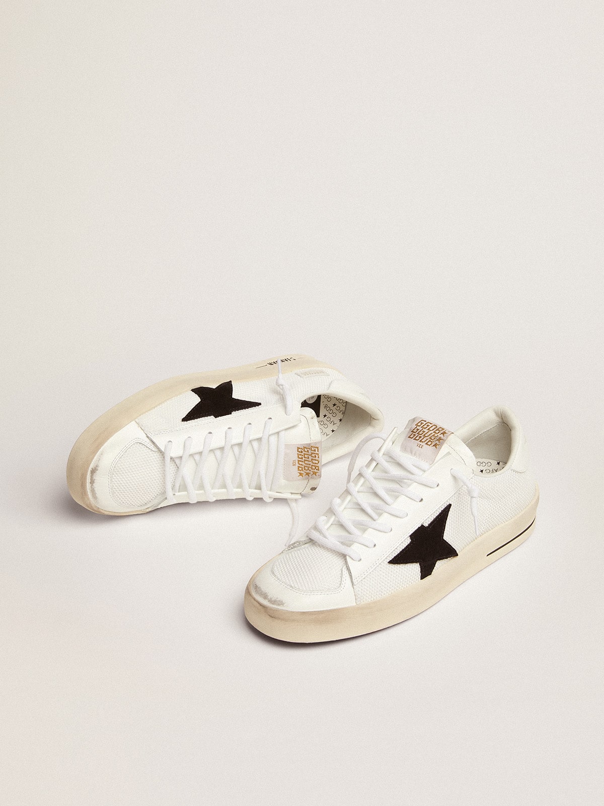 Men's Stardan in white mesh with black suede star | Golden Goose