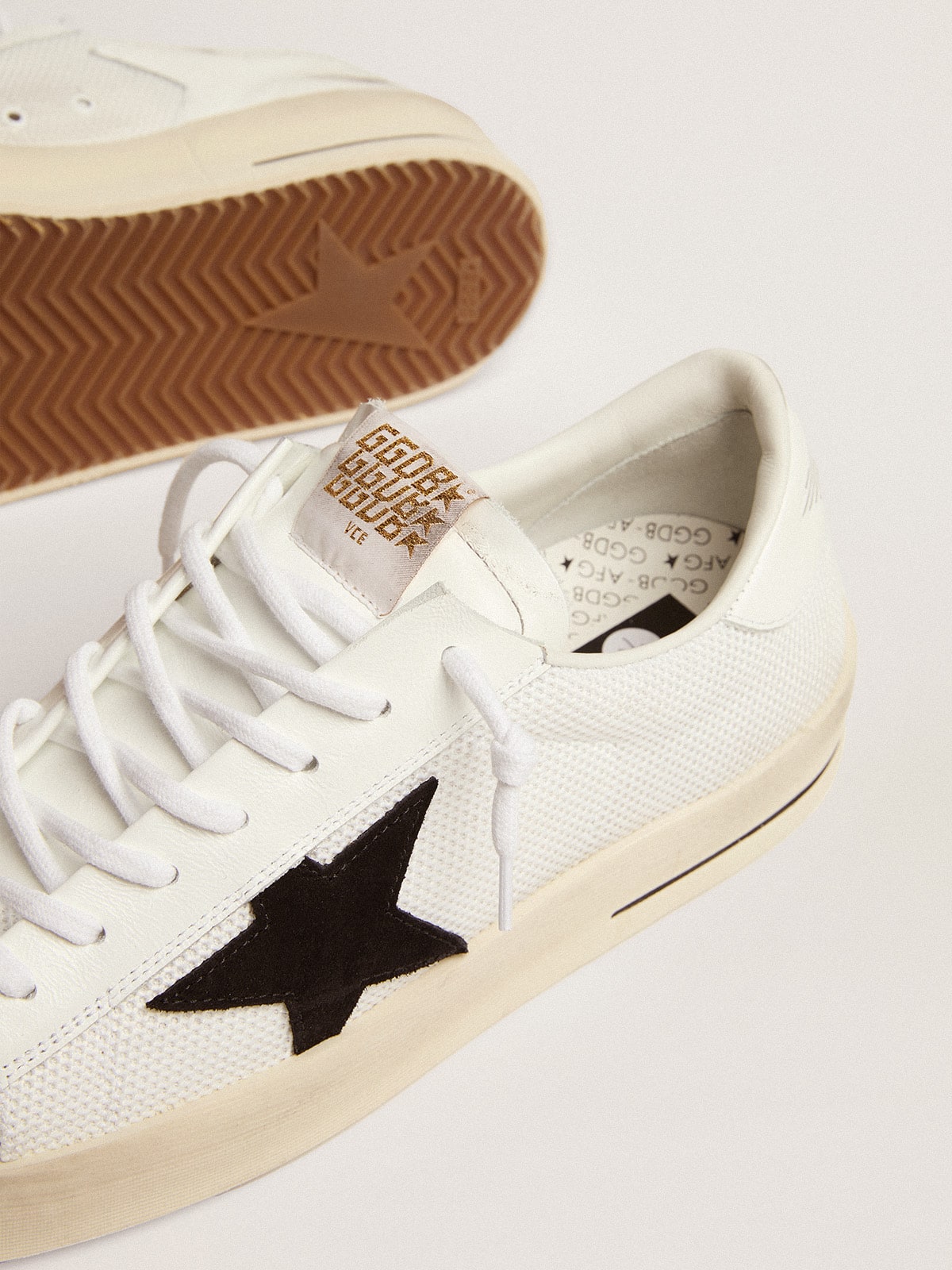 Men's Stardan in white mesh with black suede star | Golden Goose