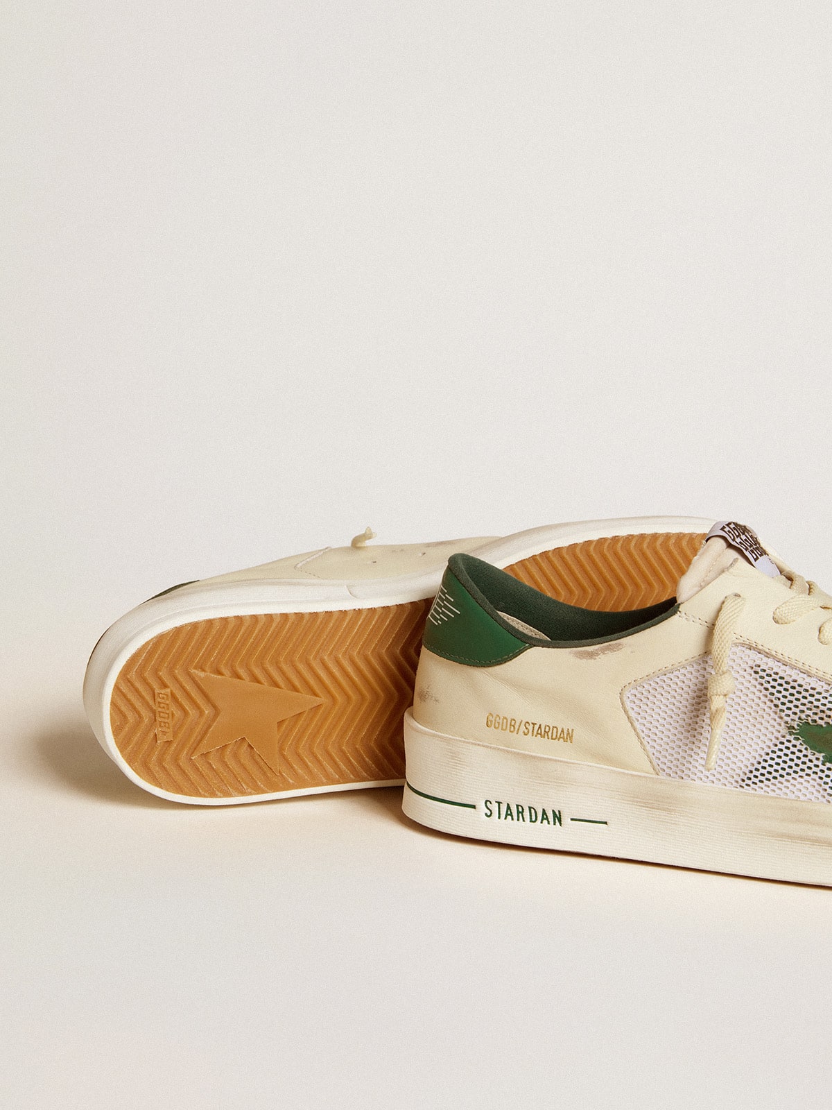 Stardan in white suede and mesh with green leather star and heel tab | Golden Goose