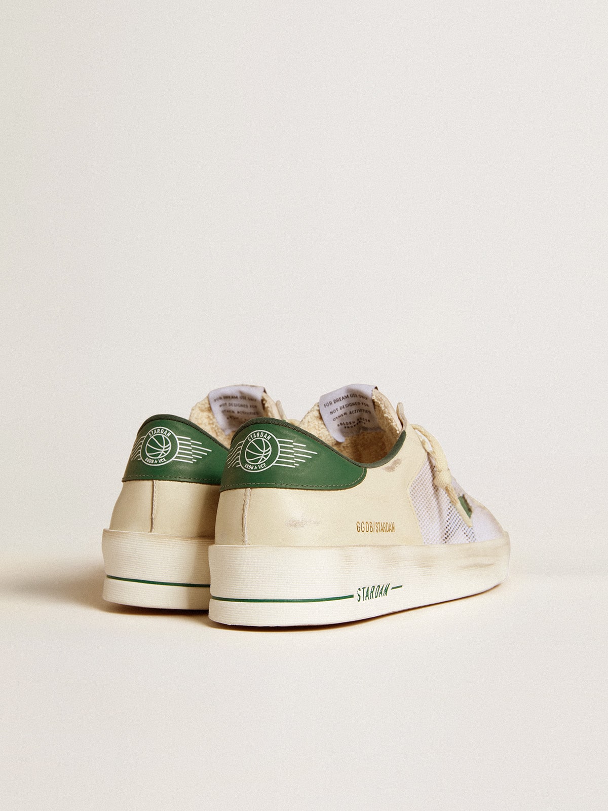 Stardan in white suede and mesh with green leather star and heel tab | Golden Goose