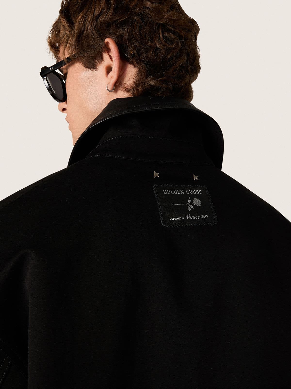 Men's short padded jacket in black cotton with leather collar | Golden Goose