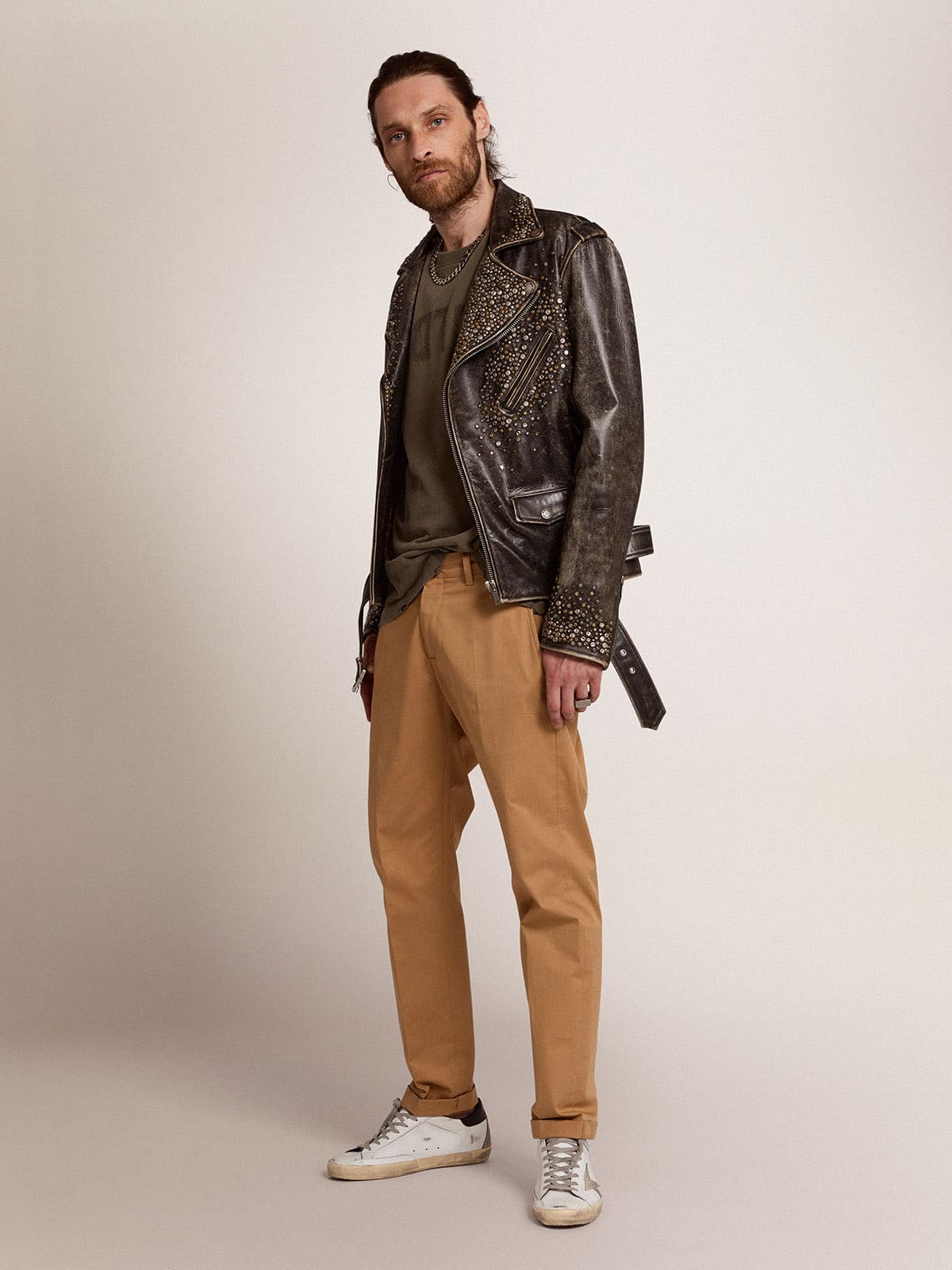 Men's leather biker jacket with hammered studs and adhesive tape | Golden Goose